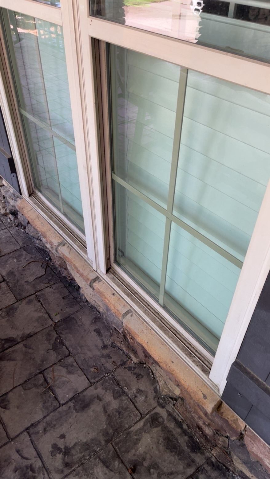 Dirty window before EXClean cleaning — patio slider brought back to clear